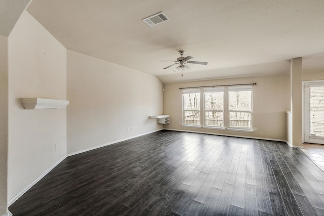 unfurnished living room with ceiling fan, vaulted ceiling, and dark hardwood / wood-style floors