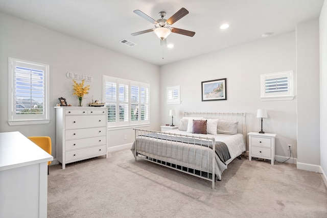 carpeted bedroom featuring ceiling fan