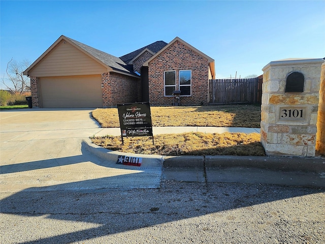 view of front of home with a garage