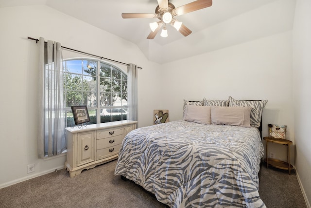 carpeted bedroom featuring vaulted ceiling and ceiling fan