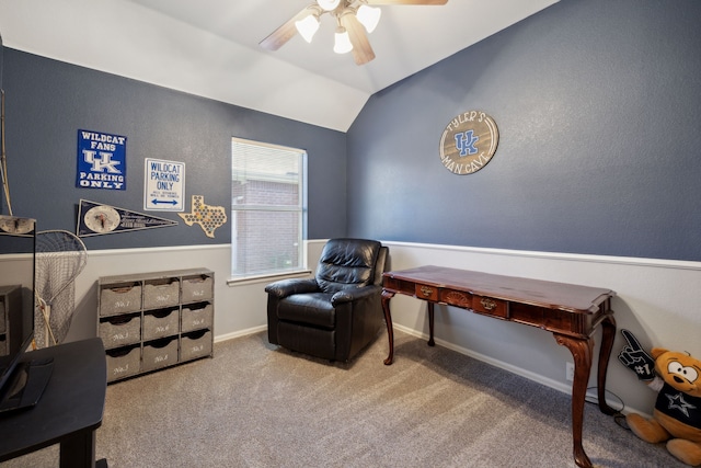 living area featuring ceiling fan, lofted ceiling, and carpet floors