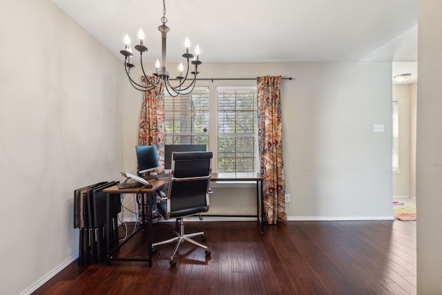 home office with hardwood / wood-style flooring and a chandelier