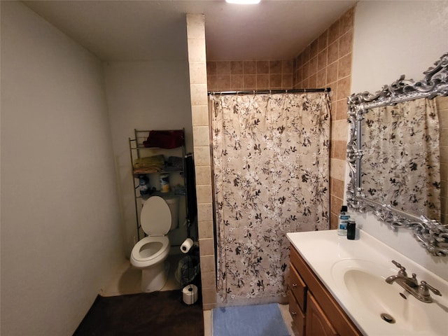 bathroom featuring a shower with curtain, toilet, and vanity