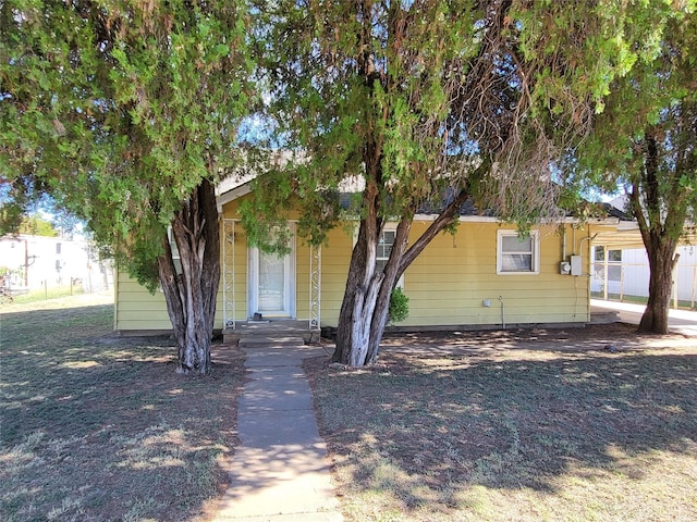 view of front of home with a carport