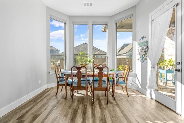 interior space with hardwood / wood-style floors