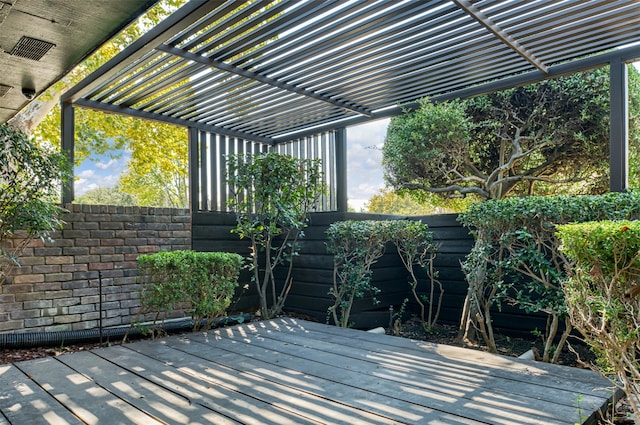 wooden deck with a pergola