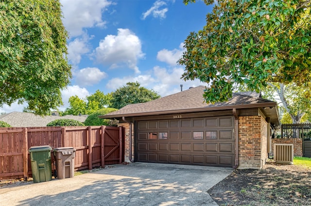 garage featuring central AC unit