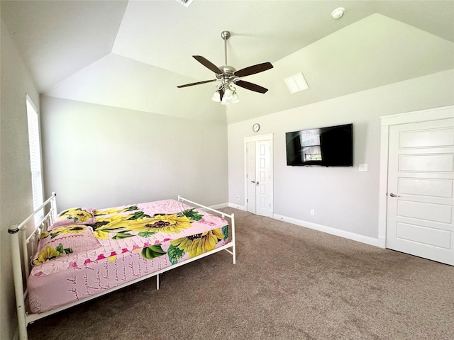 bedroom featuring ceiling fan, lofted ceiling, and carpet floors