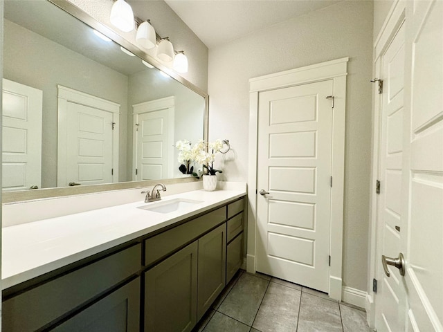 bathroom with vanity and tile patterned floors