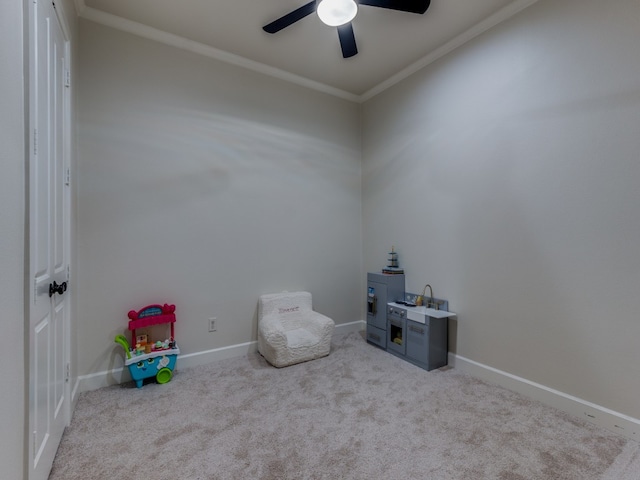 unfurnished room featuring light carpet, crown molding, and ceiling fan