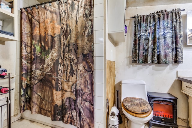 full bathroom featuring vanity, shower / bath combo, toilet, and tile patterned flooring