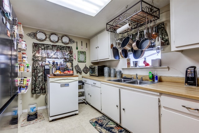 kitchen with white cabinets and sink