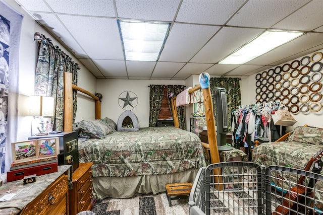 bedroom featuring a drop ceiling