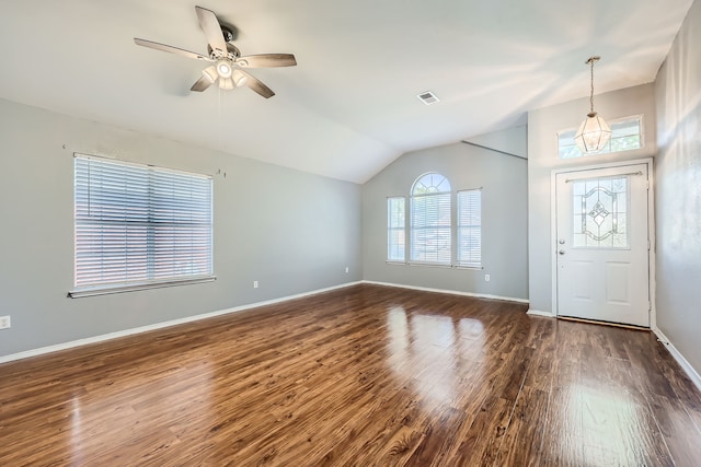 foyer entrance featuring lofted ceiling, ceiling fan, and dark hardwood / wood-style flooring