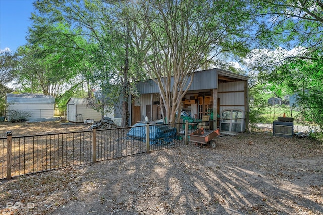 view of front of house featuring an outbuilding