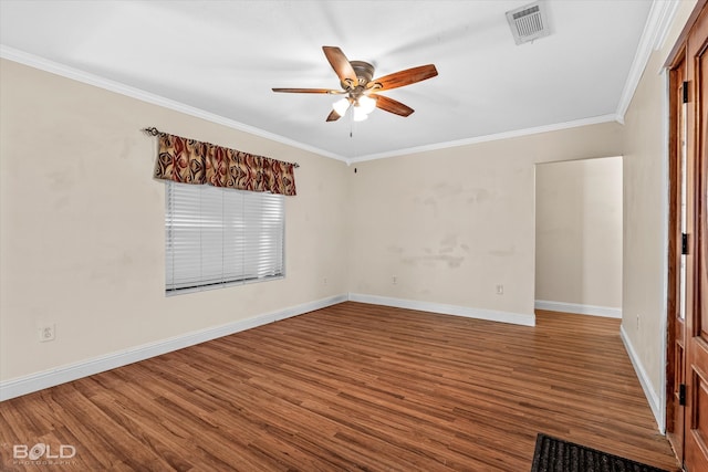 empty room featuring crown molding, wood-type flooring, and ceiling fan