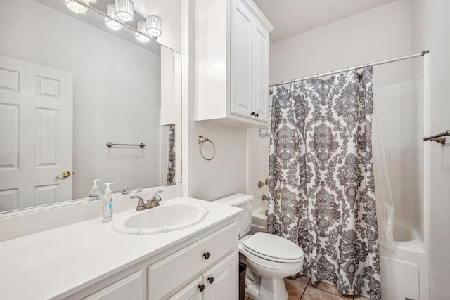 full bathroom with tile patterned flooring, vanity, shower / tub combo, and toilet