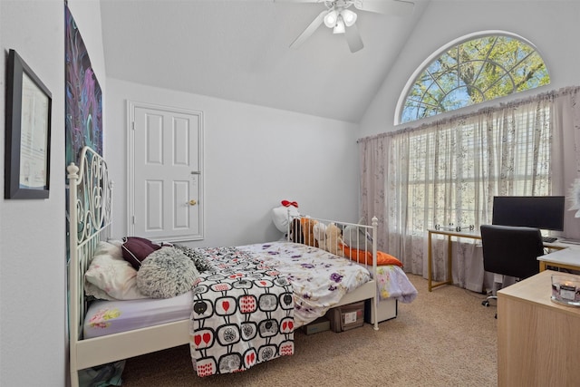 bedroom with light colored carpet, vaulted ceiling, and ceiling fan