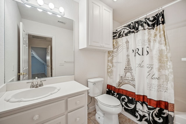 full bathroom featuring toilet, tile patterned floors, vanity, and shower / tub combo with curtain