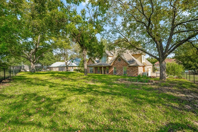 view of yard featuring a fenced backyard