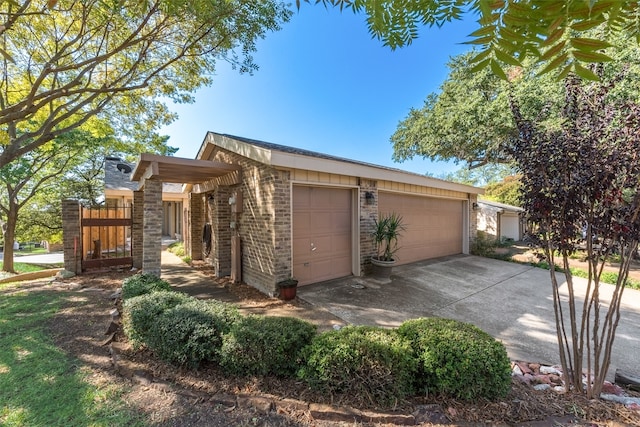 view of property exterior featuring a garage