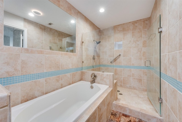 bathroom with independent shower and bath