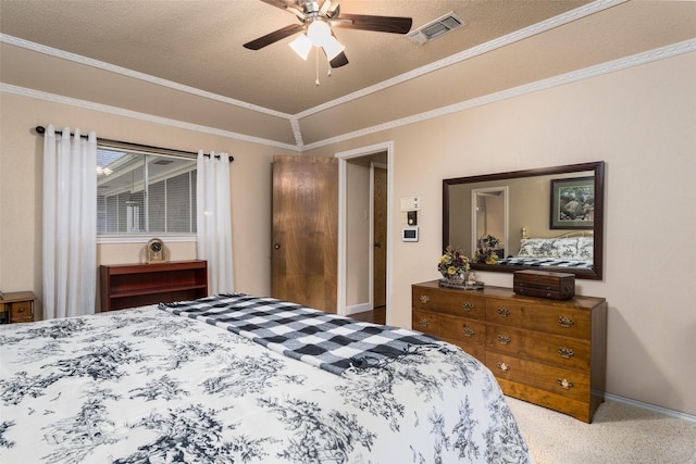 bedroom featuring a textured ceiling, ceiling fan, crown molding, and light carpet