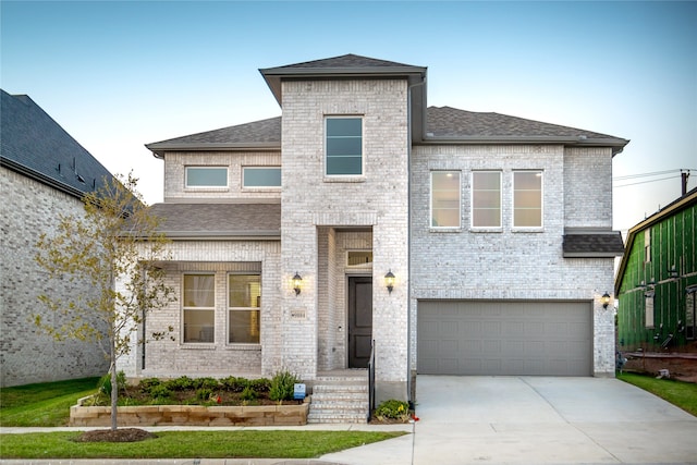 view of front of home with a garage