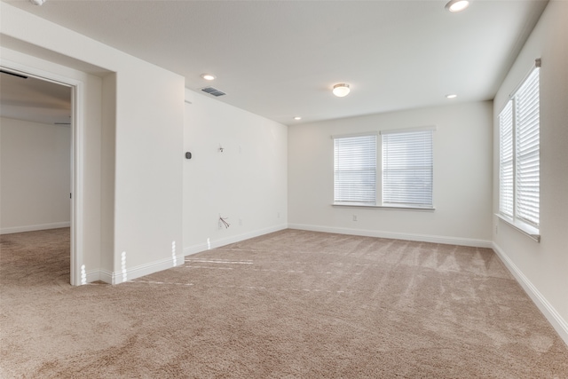 empty room featuring carpet flooring