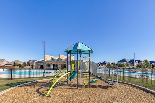 view of play area with a community pool