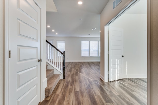 foyer entrance featuring hardwood / wood-style flooring