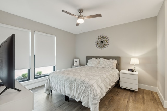 bedroom featuring ceiling fan and hardwood / wood-style floors