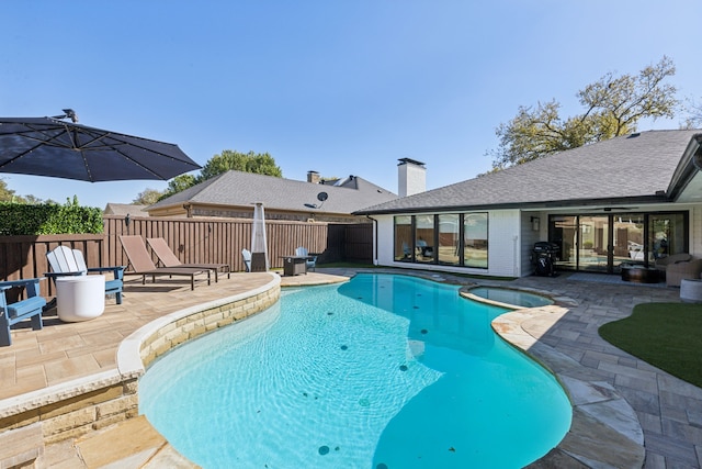 view of pool with a patio