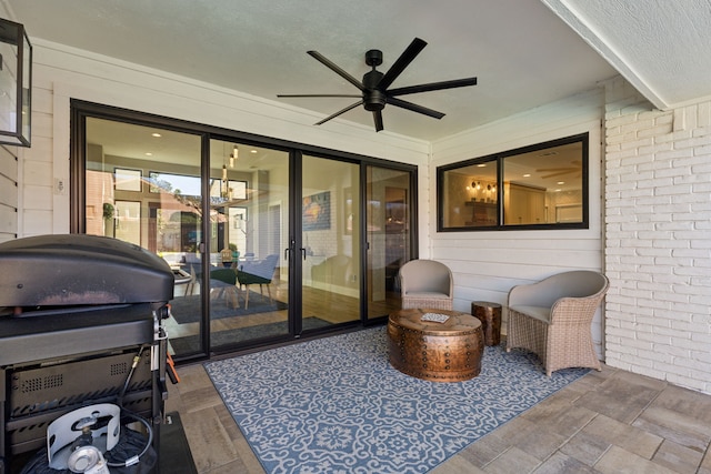 view of patio / terrace featuring ceiling fan