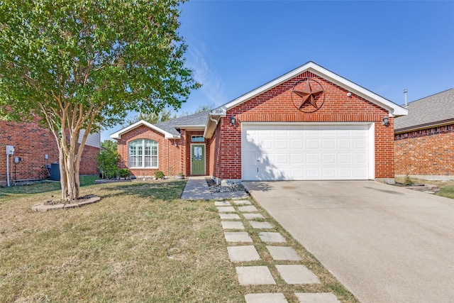 view of front of property with a front lawn and a garage