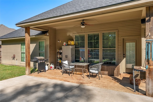 view of patio / terrace featuring ceiling fan and a grill