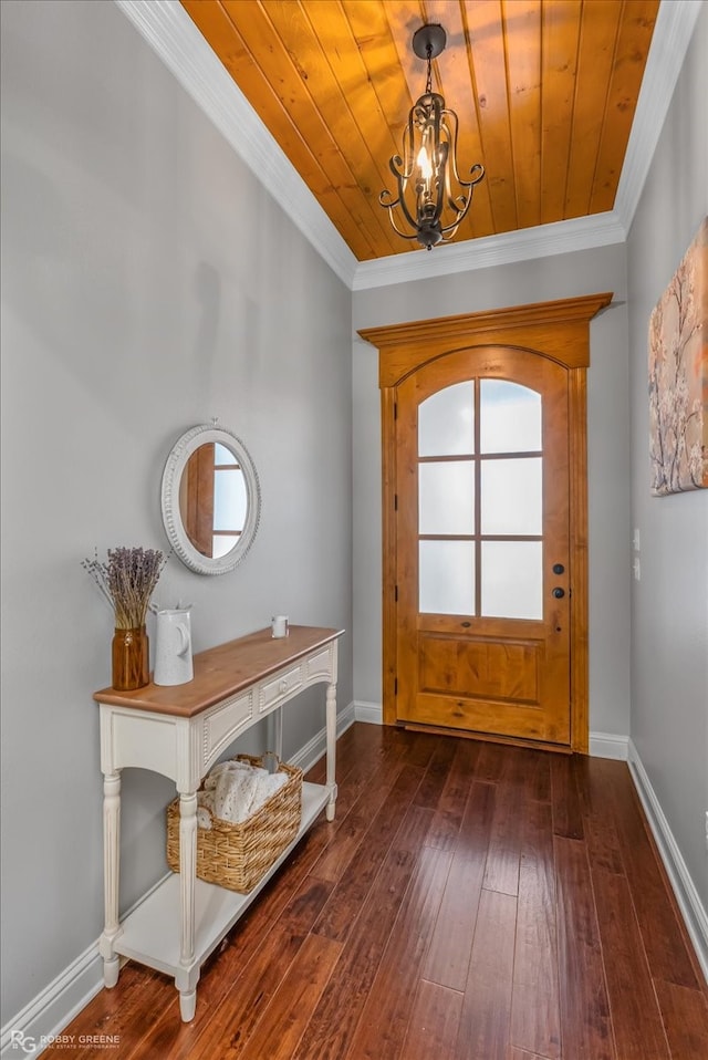 entrance foyer featuring a wealth of natural light, ornamental molding, dark hardwood / wood-style floors, and wooden ceiling