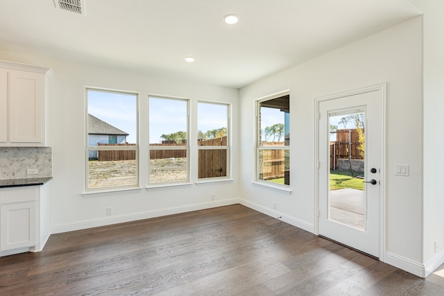 interior space with dark hardwood / wood-style floors