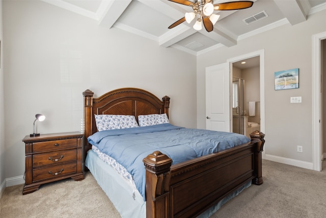 carpeted bedroom with crown molding, beamed ceiling, connected bathroom, and ceiling fan