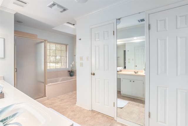 bathroom with vanity, crown molding, shower with separate bathtub, and tile patterned flooring