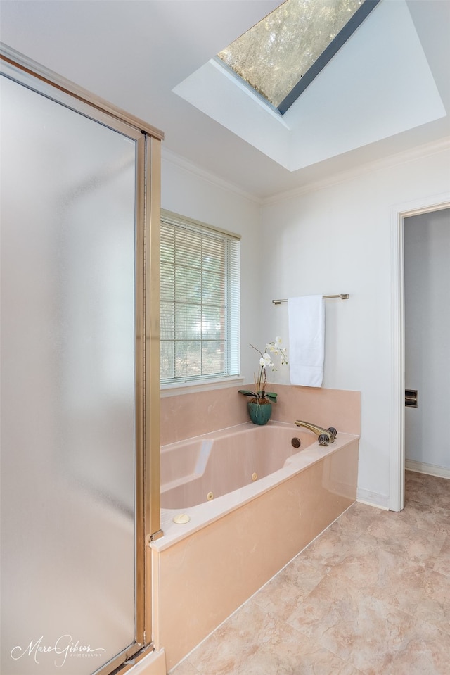 bathroom with crown molding, shower with separate bathtub, a tray ceiling, and a skylight