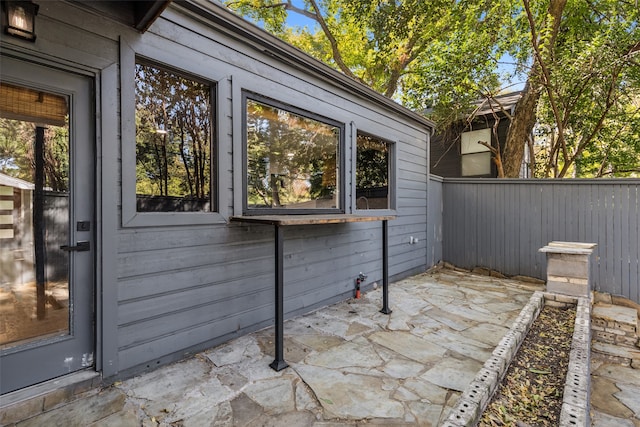 view of property exterior featuring a patio