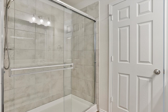 bathroom featuring walk in shower