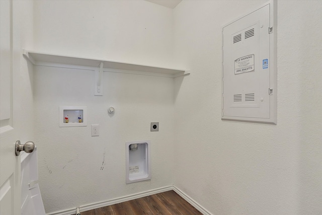 laundry area with hookup for a washing machine, electric dryer hookup, hookup for a gas dryer, and dark hardwood / wood-style flooring