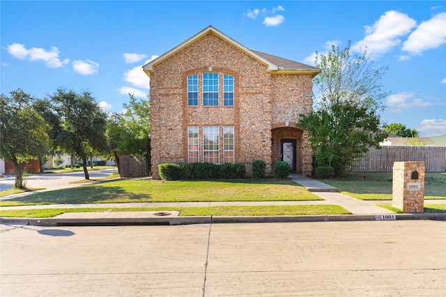 front of property featuring a front lawn