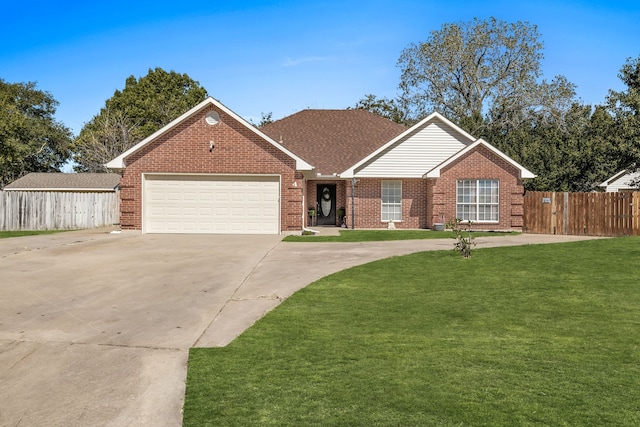 single story home featuring a front yard and a garage