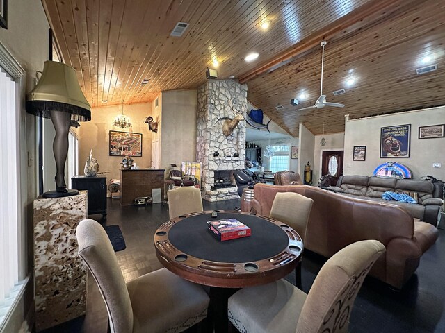 interior space featuring wood ceiling, a notable chandelier, plenty of natural light, and vaulted ceiling