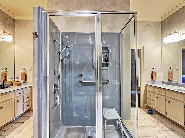 bathroom featuring vanity, crown molding, and a shower with door