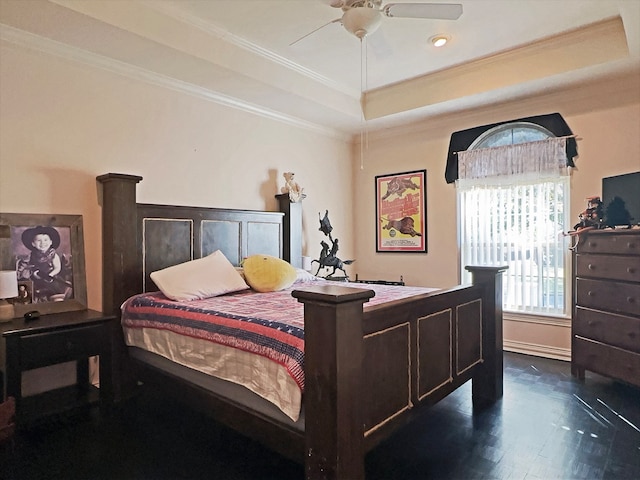 bedroom with dark hardwood / wood-style flooring, crown molding, and ceiling fan