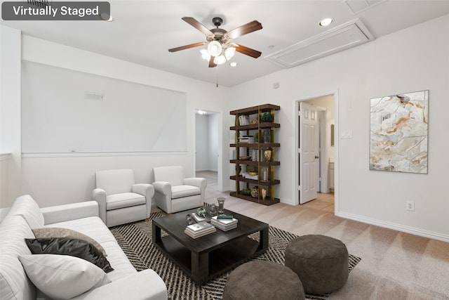 carpeted living room featuring ceiling fan